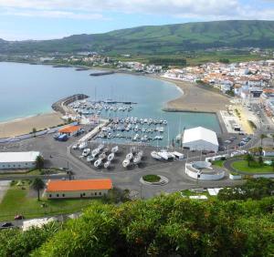 a view of a harbor with boats in the water at Alojamento Vila Flor in Praia da Vitória