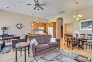a living room with a couch and a table at McGregor Condo with Brewery On-Site Steps to River! in McGregor +17 photos