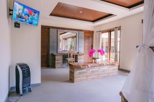 Télévision ou salle de divertissement dans l'établissement 2 Seasons : Villa Moon - Luxury with private pool