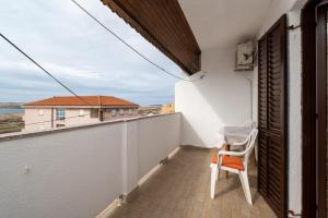 Balkón nebo terasa v ubytování Apartments and rooms with parking space Zubovici, Pag - 16063