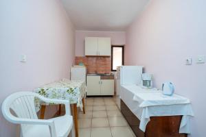 Kuchyň nebo kuchyňský kout v ubytování Apartments and rooms with parking space Zubovici, Pag - 16063 + 21 fotografií