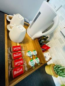a counter top with a toilet and some food at Unique Studio Flat in City 1110 in London