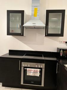 Η κουζίνα ή μικρή κουζίνα στο Fisherhut Beachfront Studios