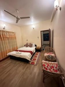 Voodi või voodid majutusasutuse Cherry Garden Pokhara toas