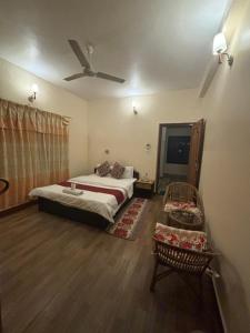 Voodi või voodid majutusasutuse Cherry Garden Pokhara toas