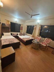 Voodi või voodid majutusasutuse Cherry Garden Pokhara toas