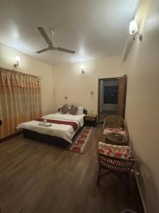 Voodi või voodid majutusasutuse Cherry Garden Pokhara toas