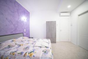 Postel nebo postele na pokoji v ubytování Residenza Ponte Catena