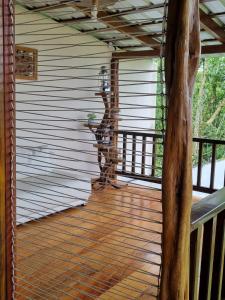 a screened in porch with a wooden deck at Rancho Mi Cielo 