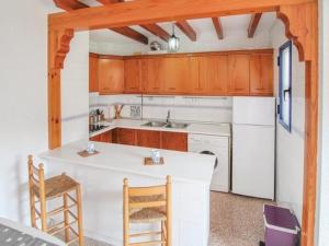 Кухня або міні-кухня у Apartamento Guardamar del Segura, 2 dormitorios, 4 personas - ES-220-11