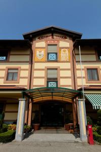 a building with a large doorway in front of it at Vald Hotel in Val Della Torre