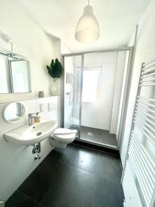 Koupelna v ubytování NStay Frankfurt