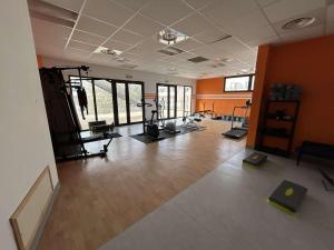 an empty room with a gym with exercise equipment at Appartement Le Grau-du-Roi, 3 pièces, 6 personnes - FR-1-250-268 in Saint-André-Lachamp
