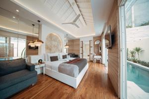 A seating area at Aleva Villa Seminyak by Ini Vie Hospitality