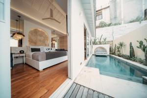 The swimming pool at or close to Aleva Villa Seminyak by Ini Vie Hospitality