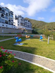 Zona de juegos infantil en Appartement vue panoramique sur mer à BELLA VISTA