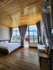 Voodi või voodid majutusasutuse Khu Nghỉ Dưỡng View Triệu Mây toas +37 fotot