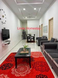 Μια τηλεόραση ή/και κέντρο ψυχαγωγίας στο Linda Homestay Gong Badak UMT UnisZa Terengganu