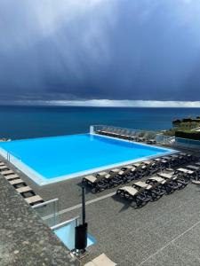Bazén v ubytování MONACO DOORS 3 Vue Mer, Piscine, Parking nebo v jeho okolí