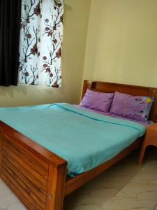Ένα ή περισσότερα κρεβάτια σε δωμάτιο στο White bungalow
