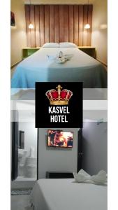 巴耶杜帕爾的住宿－Hotel Kasvel，酒店客房配有一张特大号床和一台电视。