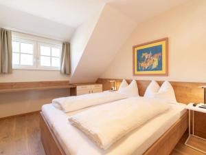 Postel nebo postele na pokoji v ubytování Heimathaus Dengg