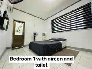 Postel nebo postele na pokoji v ubytování ALC Transient Home