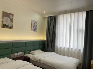 悠然居客栈客房内的一张或多张床位