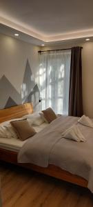 Postelja oz. postelje v sobi nastanitve Apartmán SKI Plešivec