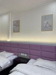 Postel nebo postele na pokoji v ubytování Youranju Guesthouse