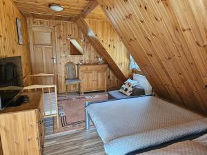 TV/Unterhaltungsangebot in der Unterkunft Ferienhaus "BASTEK1" am See mit Kamin & WLAN - Domek Letniskowy BASTEK