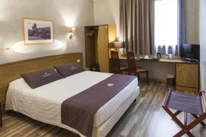 Postel nebo postele na pokoji v ubytování Tulip Inn Padova + 37 fotografií