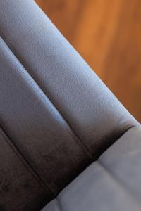 a close up of the top of a black suit at Studio Apartment with 65" Smart TV in Newport