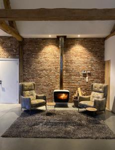 Posezení v ubytování Hoeve De Kleinheide