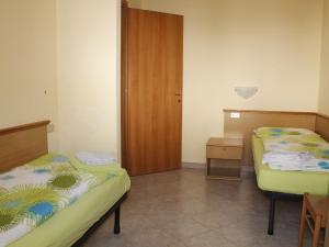 Łóżko lub łóżka w pokoju w obiekcie Comfy Holiday Home in Livigno near Ski Area
