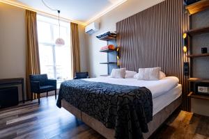 Postel nebo postele na pokoji v ubytování Hotel Zeezicht