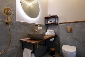 Koupelna v ubytování Hotel Zeezicht + 27 fotografií