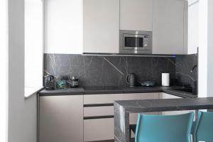 Kuchyň nebo kuchyňský kout v ubytování Villa Lucrezia - Appartamenti vista Langhe -