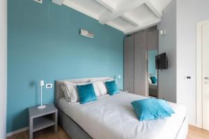 Postel nebo postele na pokoji v ubytování Villa Lucrezia - Appartamenti vista Langhe -