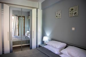 Postel nebo postele na pokoji v ubytování Anesis Apartments + 37 fotografií