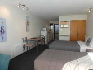 Kuchyň nebo kuchyňský kout v ubytování Wakatipu View Apartments