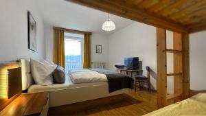 Postel nebo postele na pokoji v ubytování Residence Barbara
