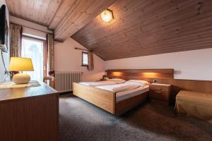 Postel nebo postele na pokoji v ubytování Hotel Goldene Rose
