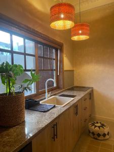 Kuchyň nebo kuchyňský kout v ubytování Mannam apartment boho + 34 fotografií