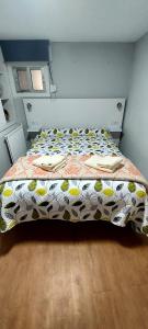 Säng eller sängar i ett rum på BAYAMO