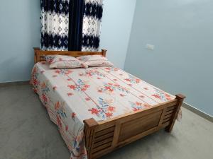 Cama ou camas em um quarto em Kausthubham