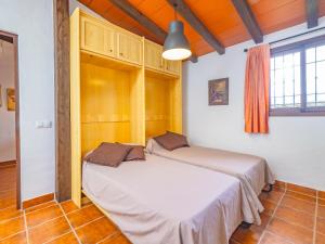 Postel nebo postele na pokoji v ubytování Cubo's Casita Rural Haro