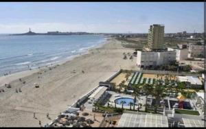 an aerial view of a beach and the ocean at Apartamento Cabo de Palos - La Manga con Aire Acondicionado in Cartagena