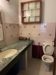 Koupelna v ubytování Kasaa Home