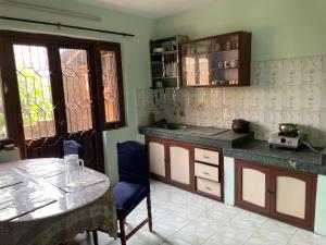 Kuchyň nebo kuchyňský kout v ubytování Kasaa Home
